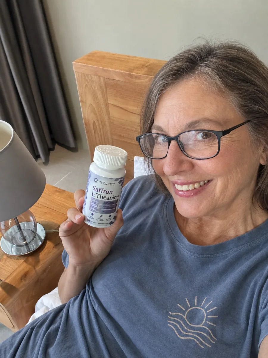 A customer holding Calm+Rest at her bedside